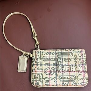 Coach Cream Clutch with Vintage Print and Wristlet Strap